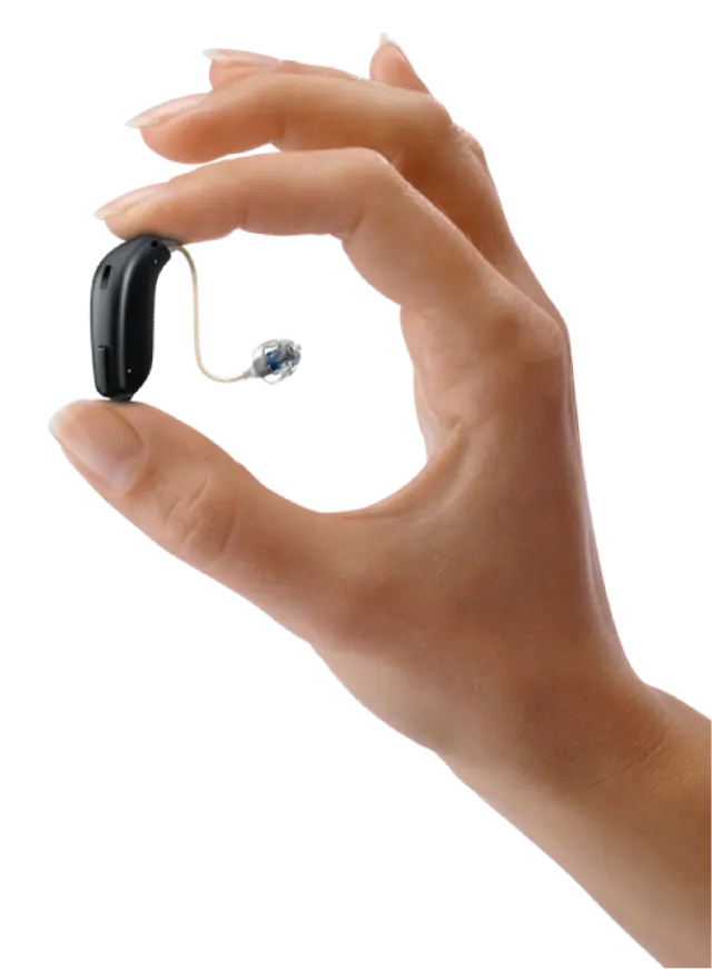 Mão segurando Oticon Siya